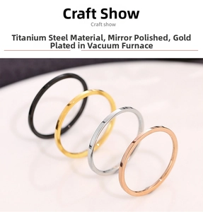 Detail of mirror polished titanium steel rings in gold, silver, black, and rose gold