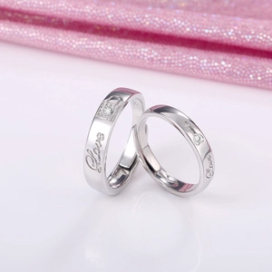 Classic silver couple rings set with lock and key design and cubic zirconia inlays
