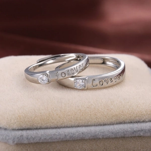 Polished silver couple rings engraved with Forever Love You and inlaid with zircons