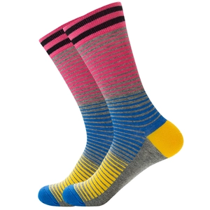 Detail of colorful striped crew socks with vibrant heel and toe stitching details