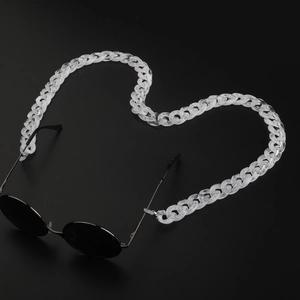 Translucent white acrylic eyewear chain in heart shape on black background