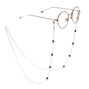 Golden chain eyewear strap with blue evil eye beads for retro round glasses