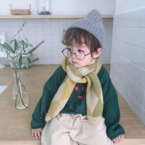 Kids knitted diamond pattern scarf and earmuff set with yellow and green accents