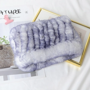 Detailed view of purple and white gradient faux fur neck warmer with soft striped texture