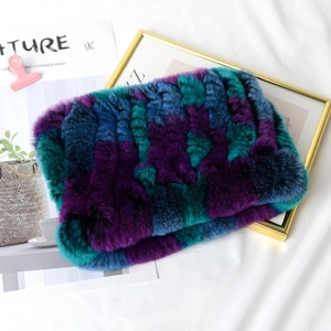 Detail of blue and purple rex rabbit fur scarf with rich texture on a stylish background