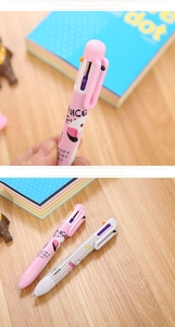 Detail of pink flamingo multi-color ballpoint pens with retractable cartoon character heads