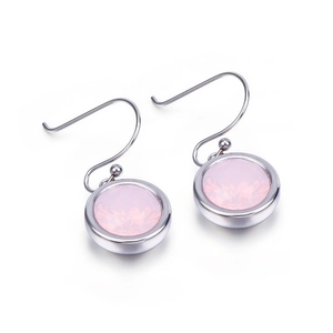 Elegant silver metal drop earrings featuring faceted round pink stones with long ear hooks