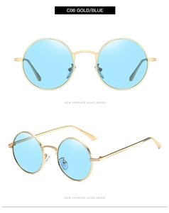 Detail view of retro round sunglasses with gold metal frame and light blue lenses C06