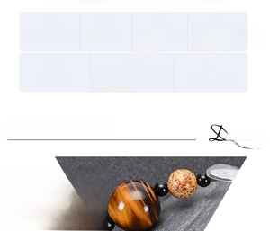 Detailed macro view showing natural tiger eye and blue goldstone beads of the solar system bracelet