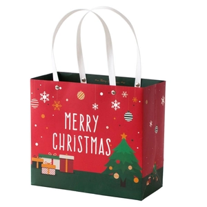 Red and green Christmas gift bag with rivets, Merry Christmas print and handle