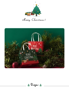 Close-up of red and green Christmas gift bags with rivet handles and festive patterns