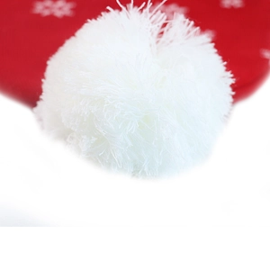 Winter Christmas knitted jacquard beanie with large white faux fur pompom in festive red