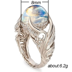 Schwanenflügel-Ring aus Silber mit 8 mm Regenbogen-Mondstein und Kristallen