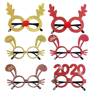 Detail of glitter Christmas glasses frames featuring reindeer antlers and holiday motifs