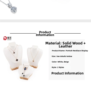 Detail of wooden necklace display stand with portrait bust and premium leather padding