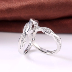 Silver couples' rings featuring 'ONLY LOVE YOU' engraving and sparkling pavé accents