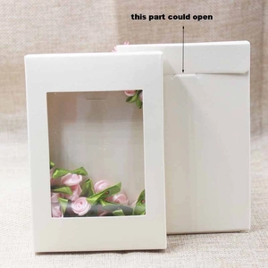 Front and back views of a white kraft paper gift box with a PVC window and folding lid