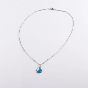 Polished stainless steel necklace with round blue iridescent mermaid scale pendant