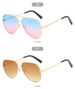 Classic aviator sunglasses with gold metal frame and gradient lenses in side view