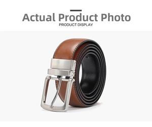 Detail of a brown leather belt with a matte silver metal pin buckle and finished edges