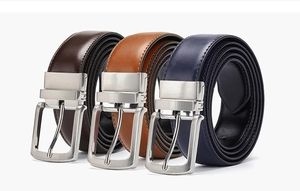 Three men's genuine leather belts in dark brown, brown and navy blue with silver buckles