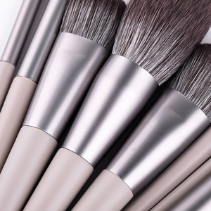 12-piece professional makeup brush set with soft dual-tone fibers and matte handles