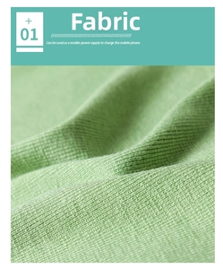 Close-up of light green knitted fabric showing detailed soft ribbed texture and fibers