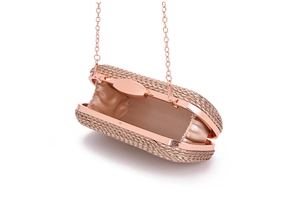 Detailed close-up of rose gold woven evening bag interior and its metallic structure