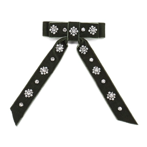 Velvet bow hair clip with pearls and crystals on a dark green fabric spring hairpin