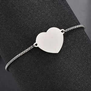 Polished heart pendant bracelet in stainless steel with adjustable box chain and silver finish
