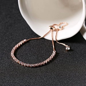Macro shot of rose gold tennis bracelet with 3mm zircons and adjustable slider clasp