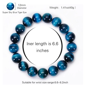 Sky blue tiger eye beaded bracelet with 12mm natural stone beads on a white background