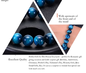 Detail shot of natural blue tiger eye stone bracelet beads with cat eye effect sheen