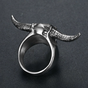 Polished stainless steel ram skull ring with vintage spiral horns in punk style