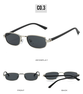 Macro detail of retro small square sunglasses with iconic striped metal hinges