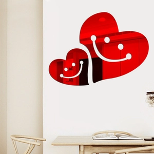 Macro detail of red heart-shaped mirror wall stickers with white smiling face design