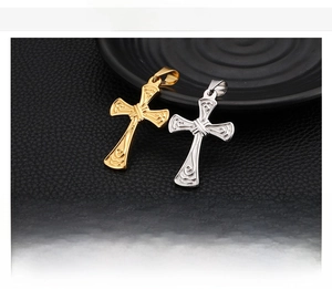 Polished gold and silver stainless steel cross pendants with wave engraving on black leather