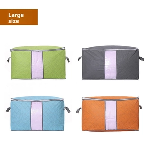 Detail of large non-woven storage bags with clear windows and reinforced handles