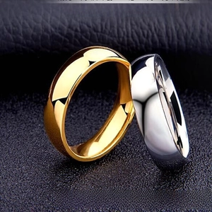 Classic titanium steel plain arc ring for men and women, simple versatile jewelry detail.