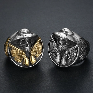 Retro stainless steel skull ring with dual revolvers and poker details in two-tone finish