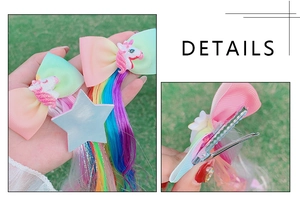 Detailed view of unicorn bow hair clip with colorful tassel and metal alligator grip