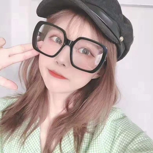 Close-up of oversized black square frame glasses on a model for a stylish look