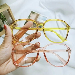 Retro transparent candy-colored large frame glasses in yellow and pink acetate finish