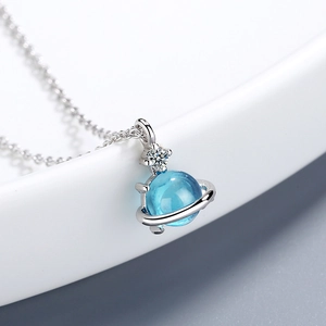Elegant blue planet pendant necklace with silver chain and zircon crystal accents