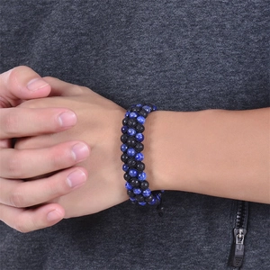 Lava rock and lapis lazuli beads woven into a double-layer adjustable bracelet for women