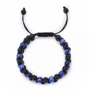 Detail of braided lava stone and lapis lazuli beads on a three-row adjustable bracelet
