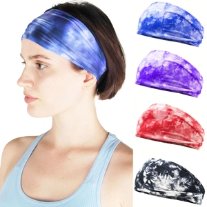Close-up of elastic tie-dye sequin headbands showing various colors and soft texture
