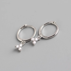 Close-up of S925 sterling silver hoop earrings with three small sparkling zircon pendants