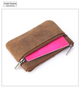 Detailed view of brown crazy horse leather coin purse with double zipper design