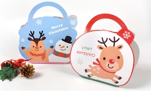 Detail of Christmas gift boxes with snowman and reindeer patterns for holiday packaging